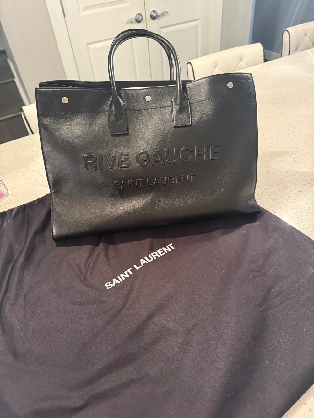 Saint Laurent Black Rive Gauche Embossed Leather Tote (or travel bag)